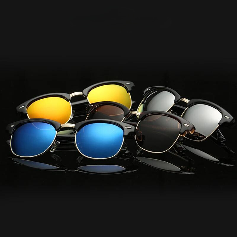 Five pairs of vintage sunglasses with half-rim black frames and mirrored, polarized lenses in blue, yellow, brown, and black offer UV protection as they rest on a glossy black surface against a black background.