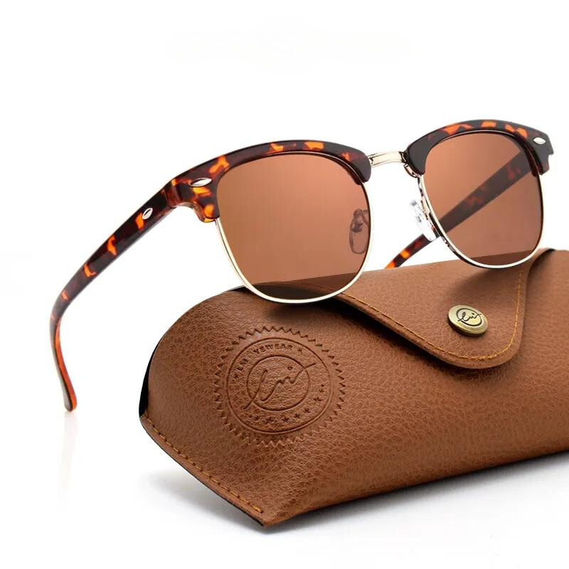 A pair of vintage sunglasses with tortoiseshell and gold frames and brown polarized lenses rests on a tan leather case embossed with a logo and fastened with a metal button.