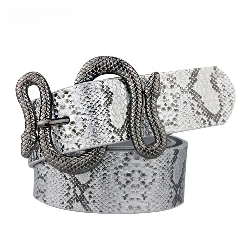 A white and gray faux-snakeskin belt featuring a latticed metal buckle shaped like a snake, displayed against a plain white background.