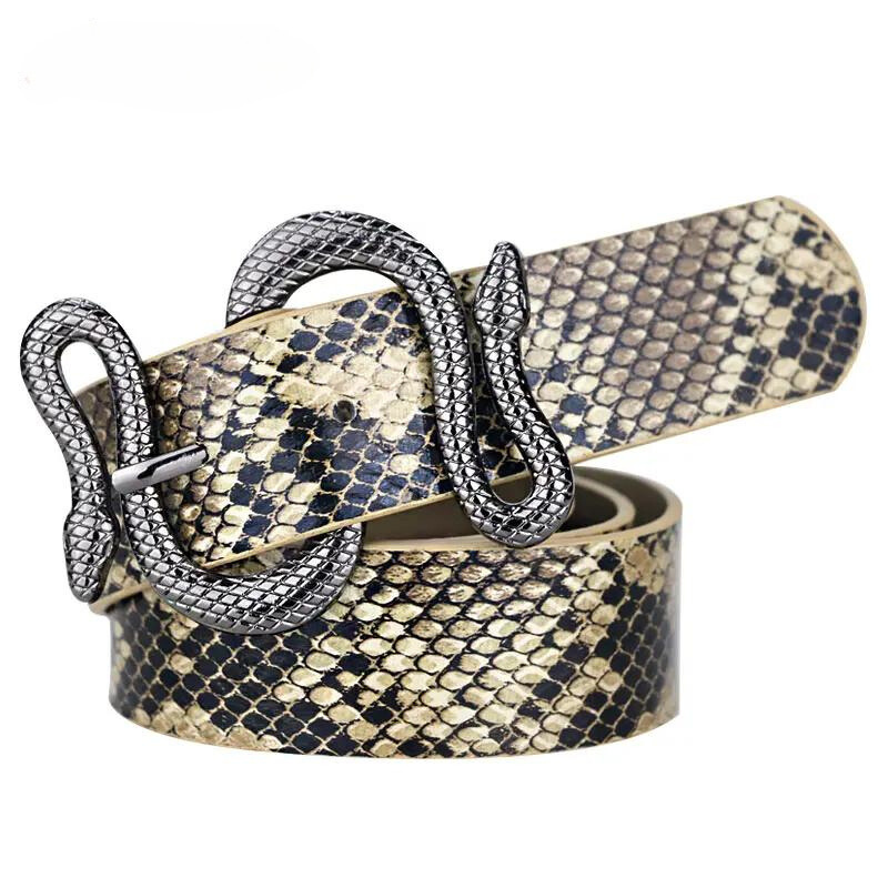A coiled faux-snakeskin belt with a detailed latticed metal buckle in an antique patina finish, displayed against a white background.