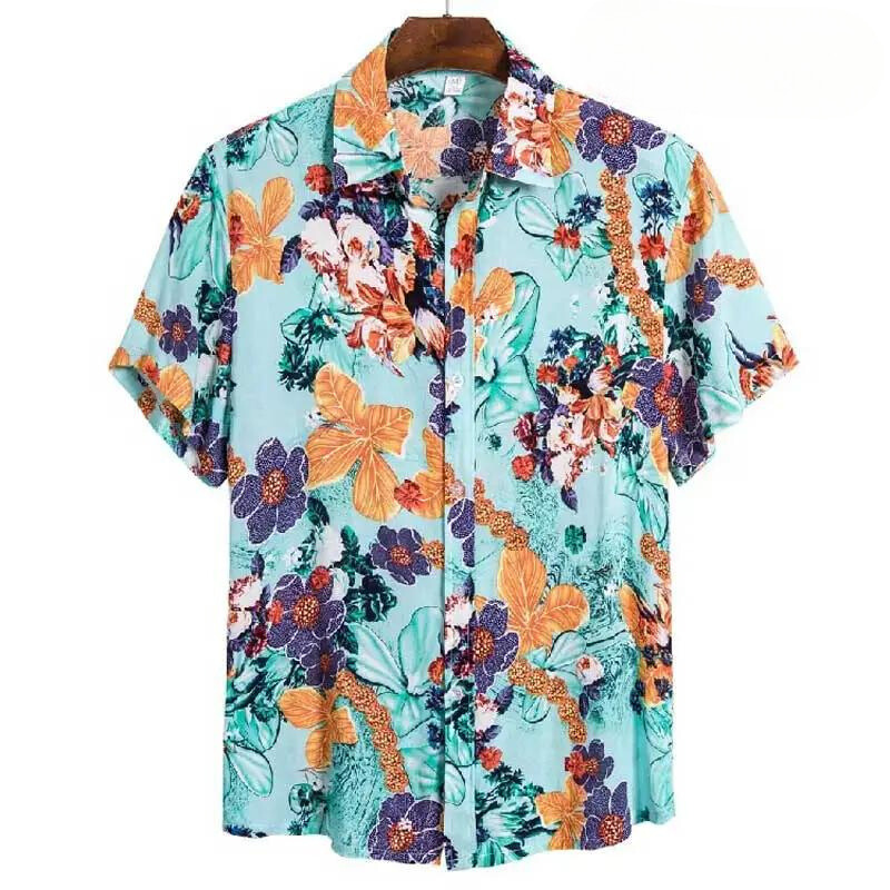 A short-sleeved, button-up floral shirt with a turquoise background, featuring a vibrant pattern in orange, purple, green, and white. Made from easy-care material, this relaxed fit shirt is displayed on a wooden hanger.