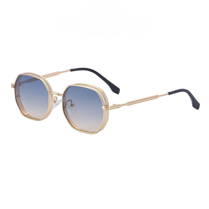 Gold-tone frames and octagonal lenses give these vintage-inspired sunglasses a chic edge. The gradient blue-to-clear lenses offer UV400 protection, while gold arms with black tips curve gently at the ends. Set against a plain white background.
