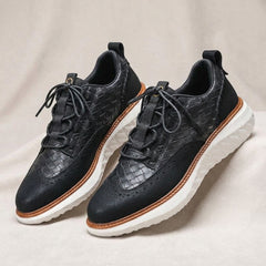 Voyage Leather Wingtip Sneakers